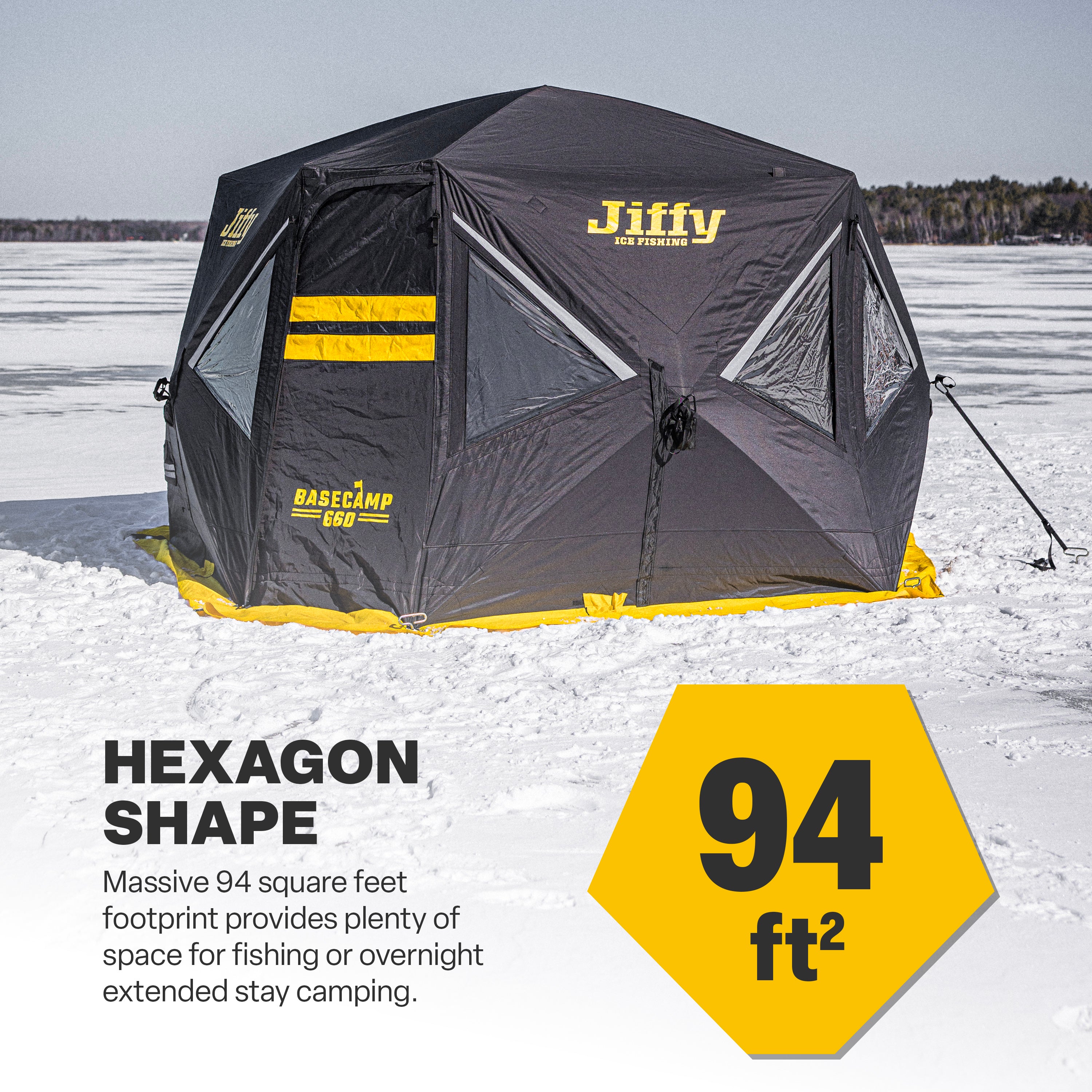 Hexagonal 94 square foot Basecamp 660 fishing tent with Jiffy branding on a snowy landscape